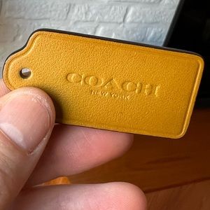 Coach Leather Hang Tag in Mustard Yellow